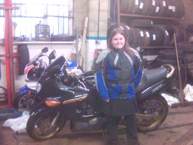 My Daughter in fron t of my new baby and our kids 900rr